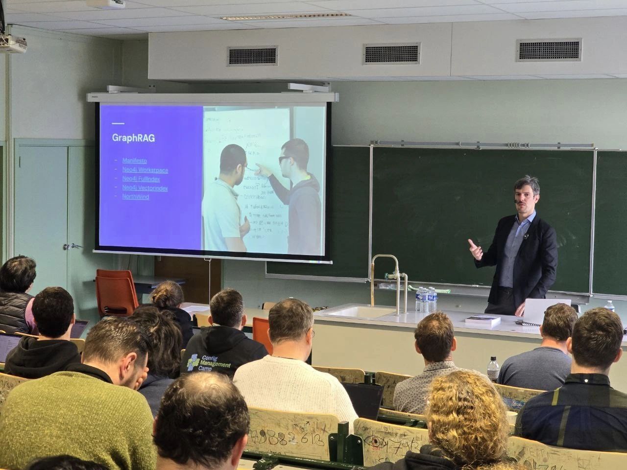 Luca Berton speaking at CfgMgmtCamp 2025 in Ghent