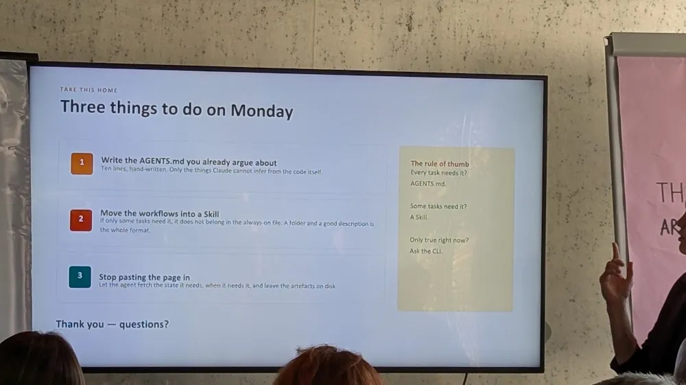 BrowserStack Meetup Amsterdam 2026 — The two talks: Eleonora Belova on Claude + Playwright, and Robert Jadoenandansing on Generative AI in QA (photo 9)