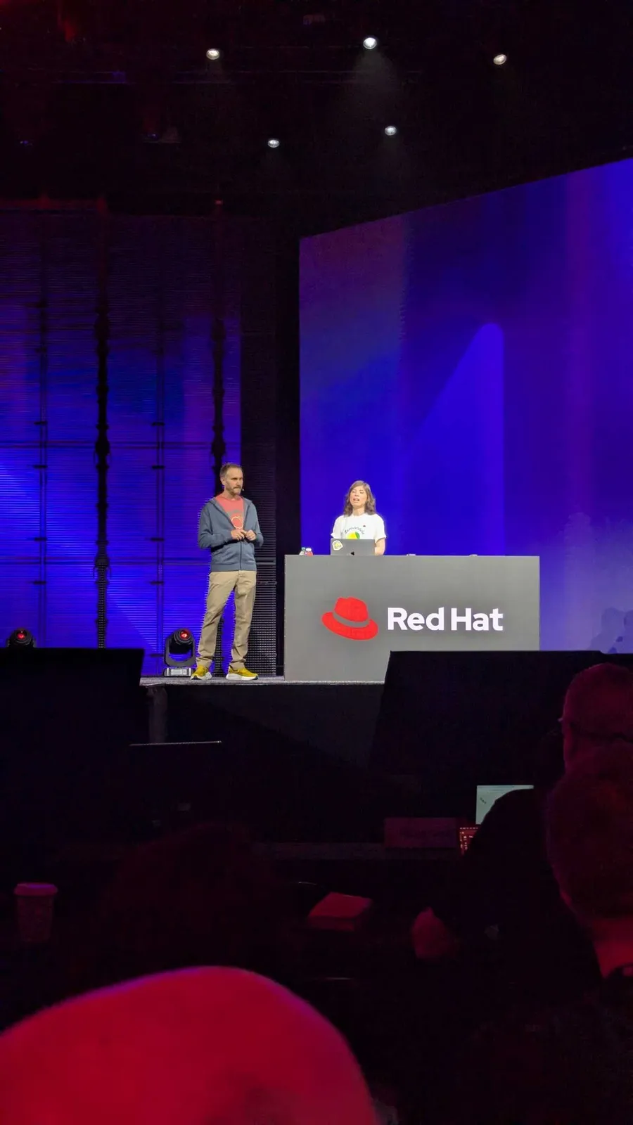 Luca Berton speaking on stage at Red Hat Summit