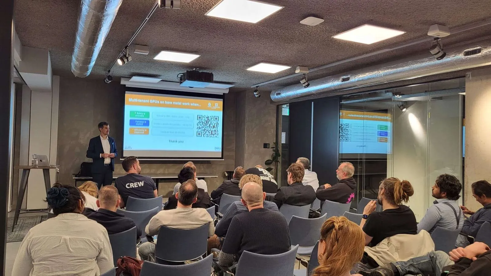 Luca Berton speaking to a technical audience at KubeCon Europe