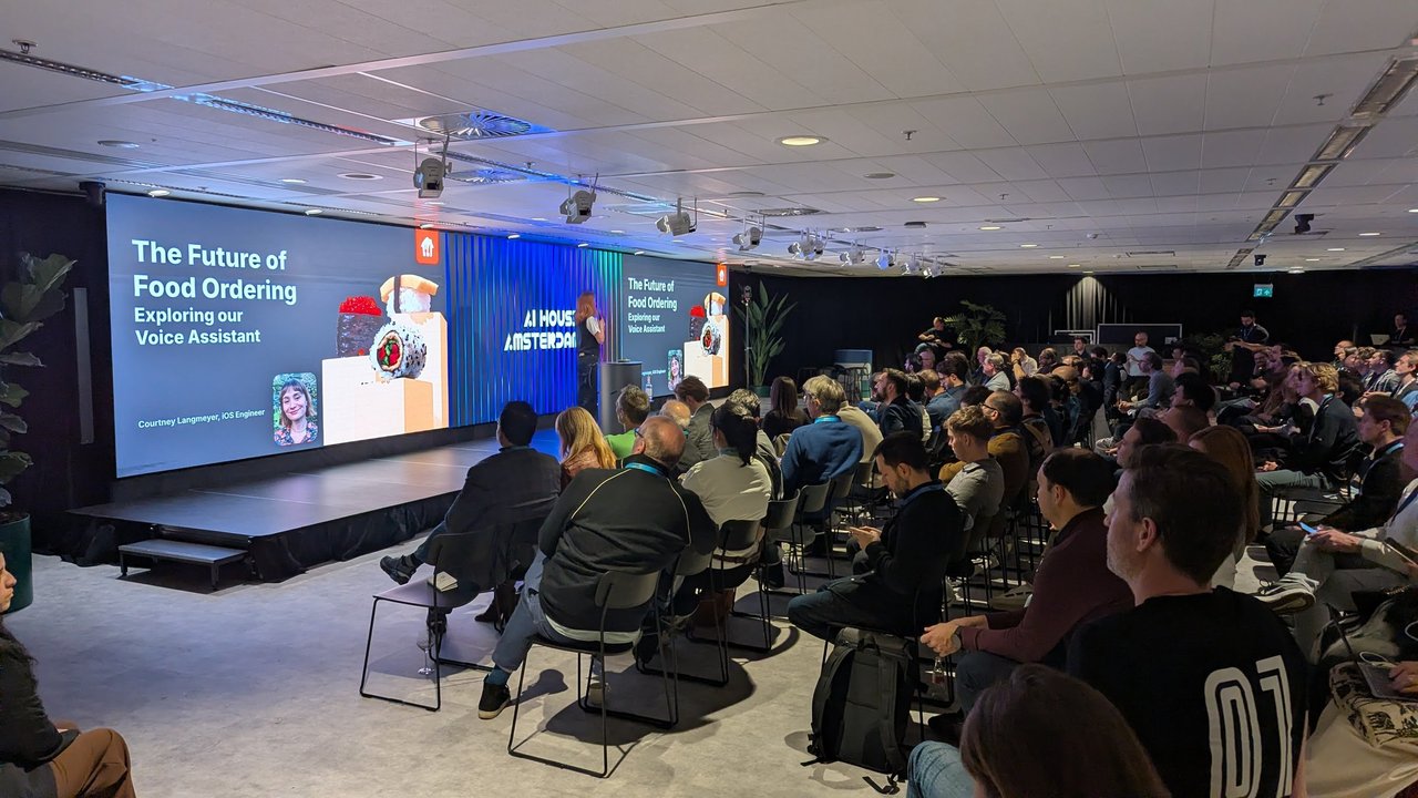 Courtney Langmeyer presenting The Future of Food Ordering: Exploring our Voice Assistant at AI House Amsterdam