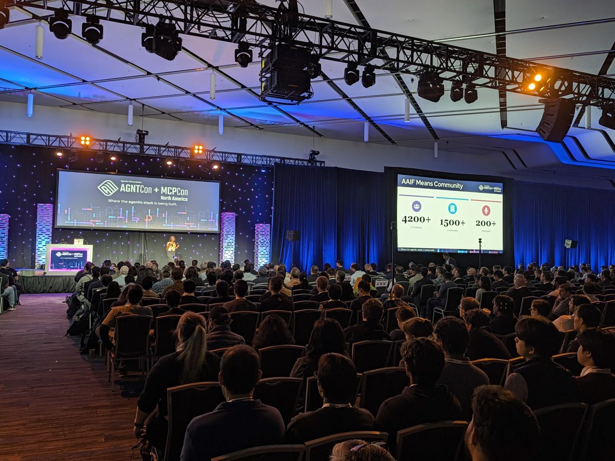 The AGNTCon + MCPCon North America keynote hall in San Jose filling up, thousands of seats in front of a stage with large screens