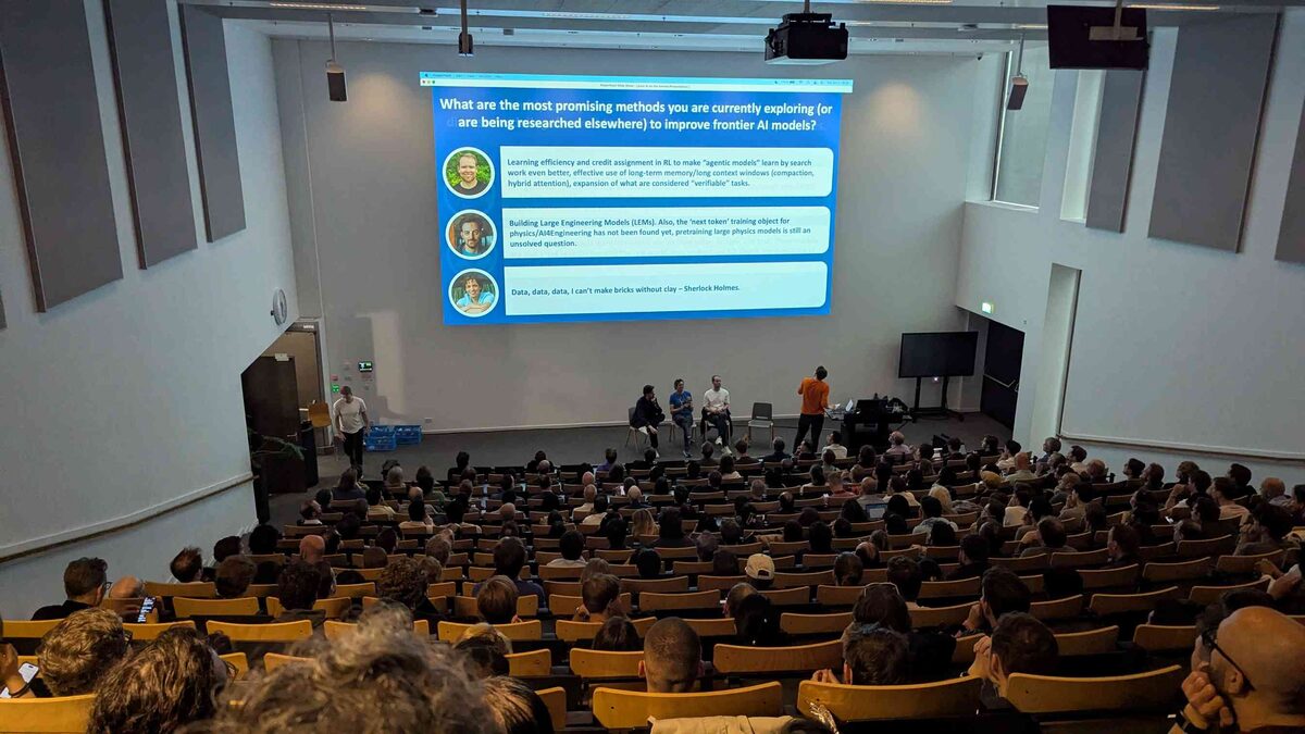Wide auditorium shot during promising methods discussion