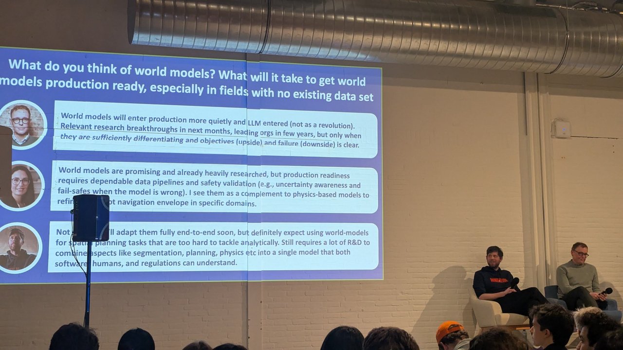 World models slide at the AI on the Amstel robotics meetup asking what it will take to get world models production ready