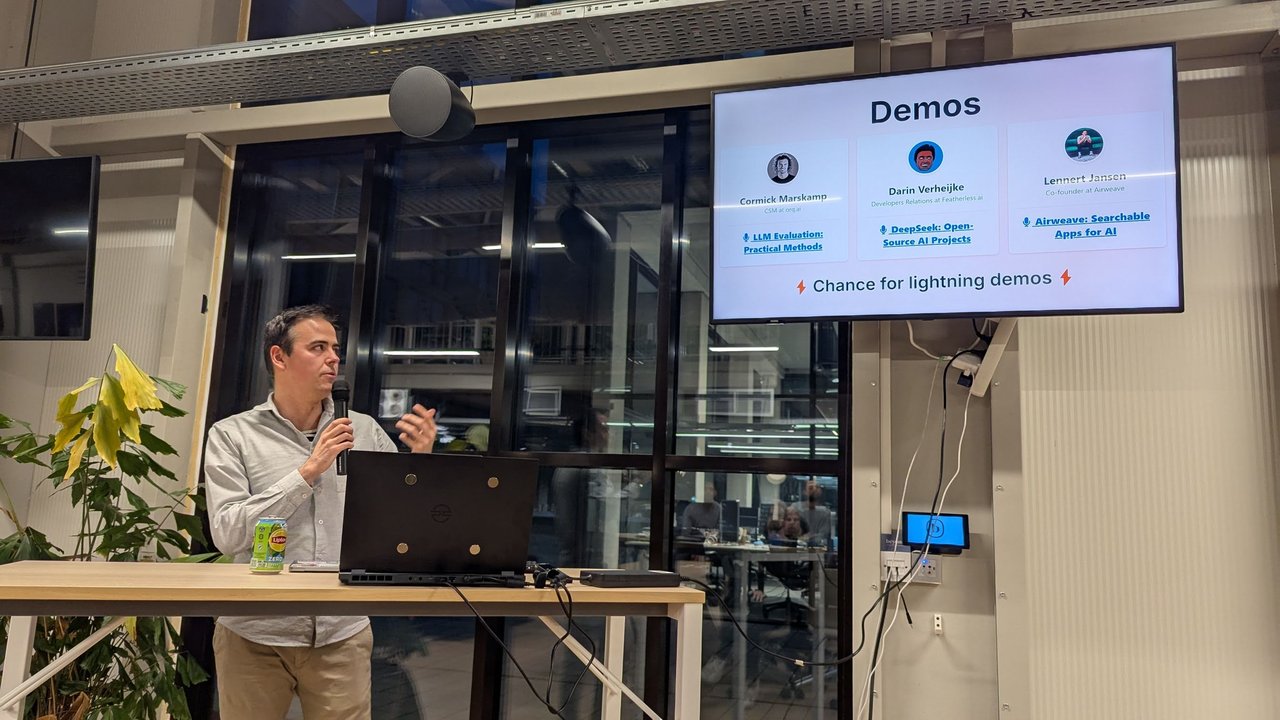 The Demos agenda slide listing the three February 2025 AI Tinkerers Amsterdam demos and a chance for lightning demos