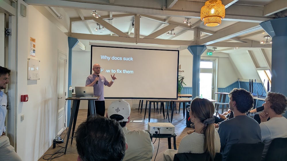 Max Kahan presenting Your Docs Make Me Angry at AI Builders Amsterdam