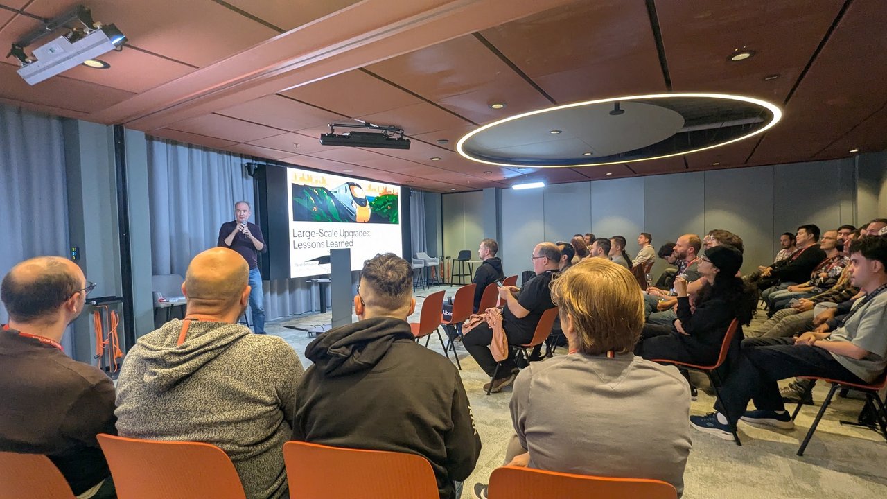 Pavel Belousov presenting Large-Scale Upgrades: Lessons Learned to a seated audience at the Friends of OpenJDK meetup at Uber Amsterdam