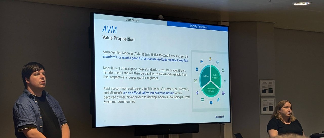 The AVM Value Proposition slide from the Rabobank talk, with the two speakers on either side of the screen