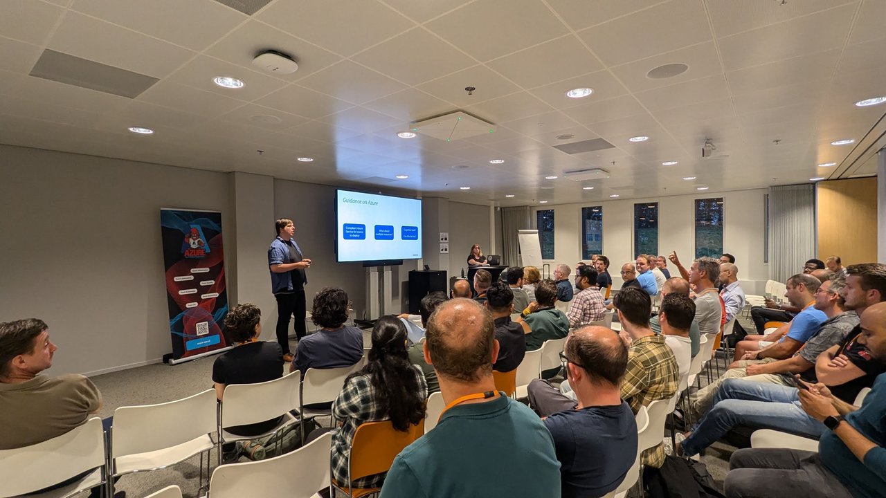 A full meeting room in Utrecht during the Rabobank talk, with a Guidance on Azure slide on the screen and the Azure Platform Engineering banner on the left