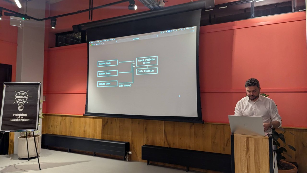 Diagram at Claude Code Meetup Amsterdam with three Claude Code boxes connected via hooks to an Agent Policies Server holding 200+ policies