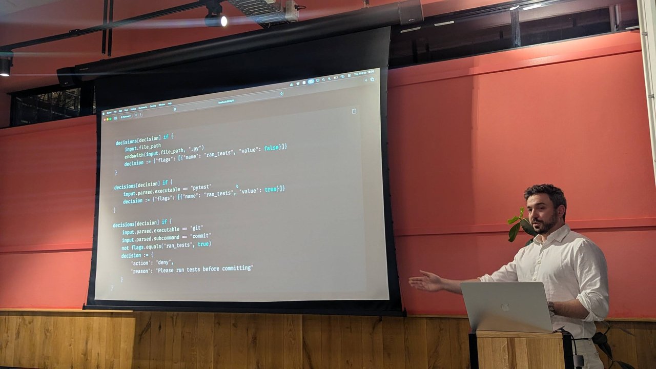 Rego-style policy rules on screen setting a ran_tests flag on Python edits and pytest runs, and denying git commit until tests have run
