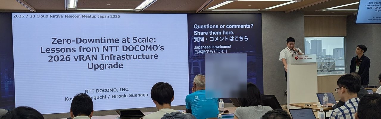 Title slide of Zero-Downtime at Scale: Lessons from NTT DOCOMO's 2026 vRAN Infrastructure Upgrade, with the two speakers at the lectern