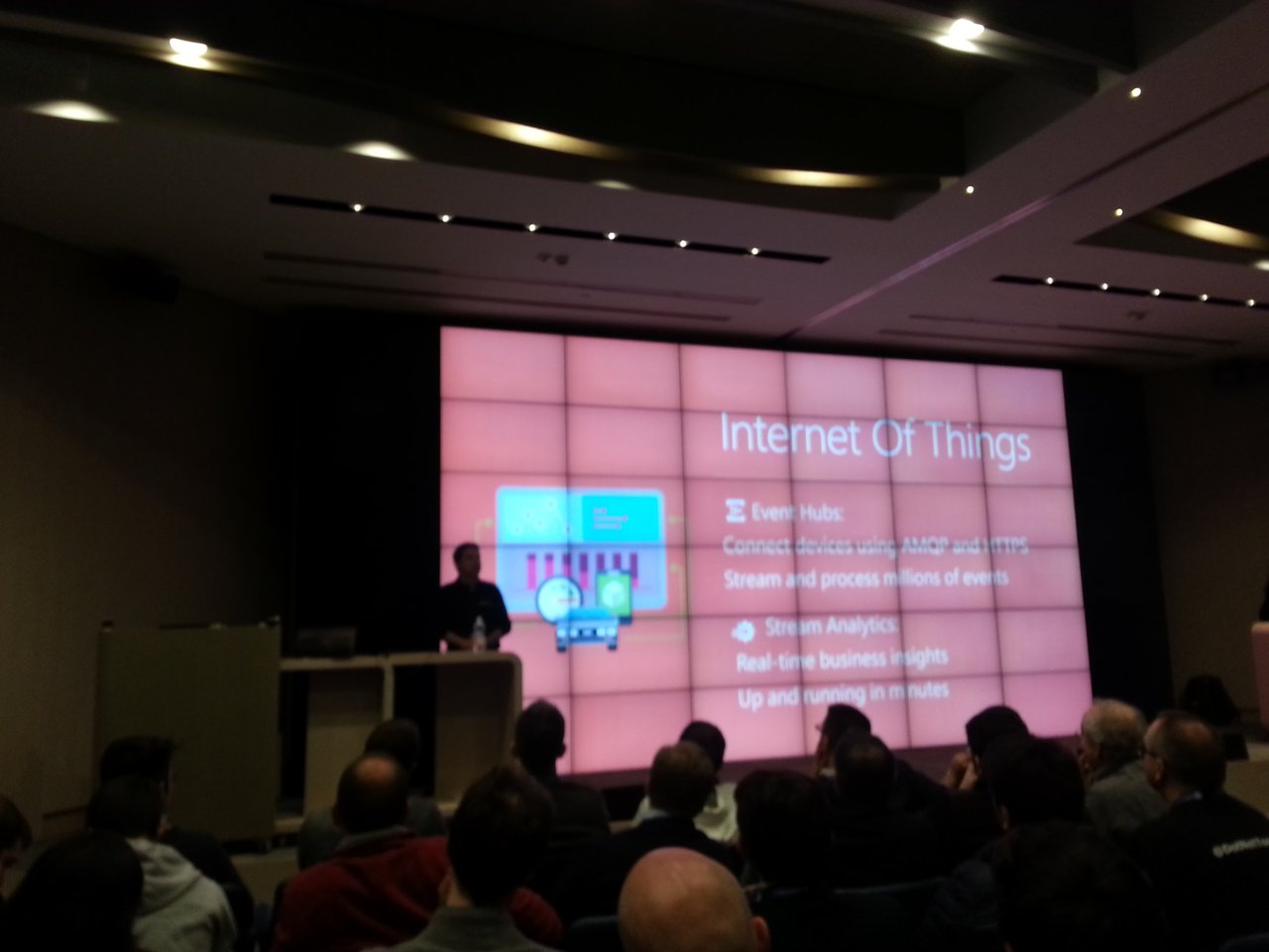 Azure keynote at Community Days 2015: an Internet Of Things slide on a large video wall listing Event Hubs and Stream Analytics, with the audience seen from behind