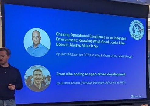 The talks slide showing Brent McLean's talk on operational excellence in an inherited environment and Gunnar Grosch's talk From vibe coding to spec-driven development
