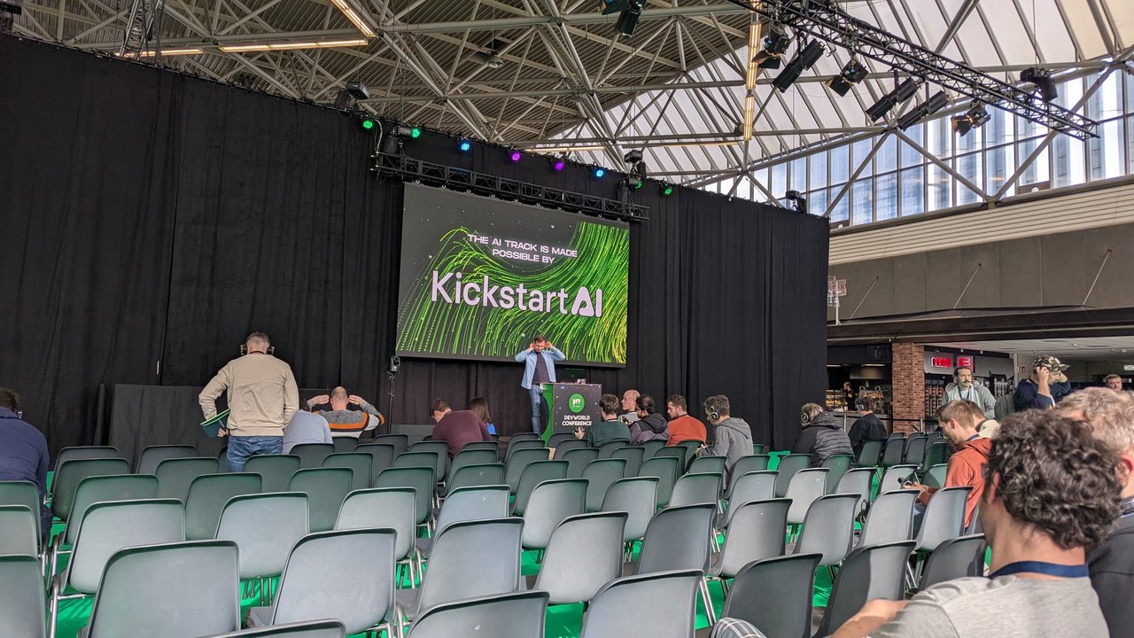DevWorld 2025 AI track stage at RAI Amsterdam with the screen reading The AI track is made possible by Kickstart AI
