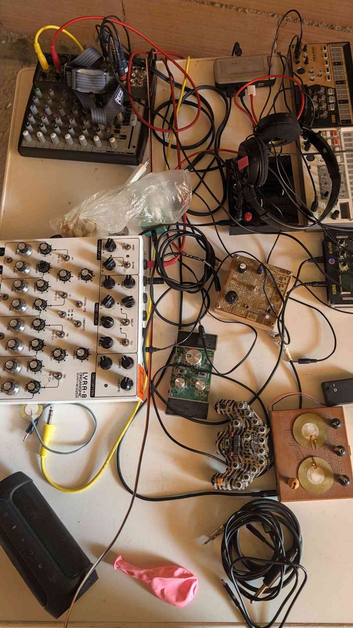 The modular synthesizer corner — LYRA-8 organic synthesizer, Korg Volca Beats, and a tangle of cables