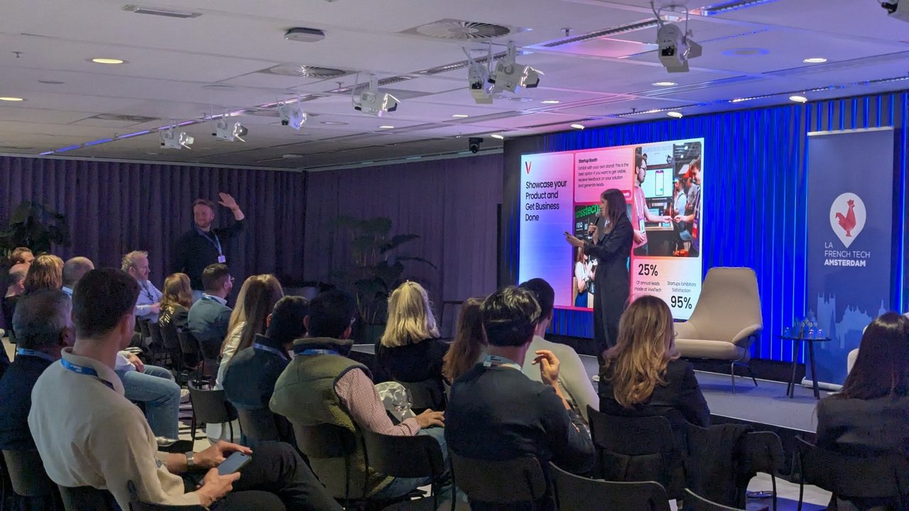 A VivaTech presenter next to a slide titled Showcase your Product and Get Business Done, with the 25% and 95% figures, in front of the seated audience