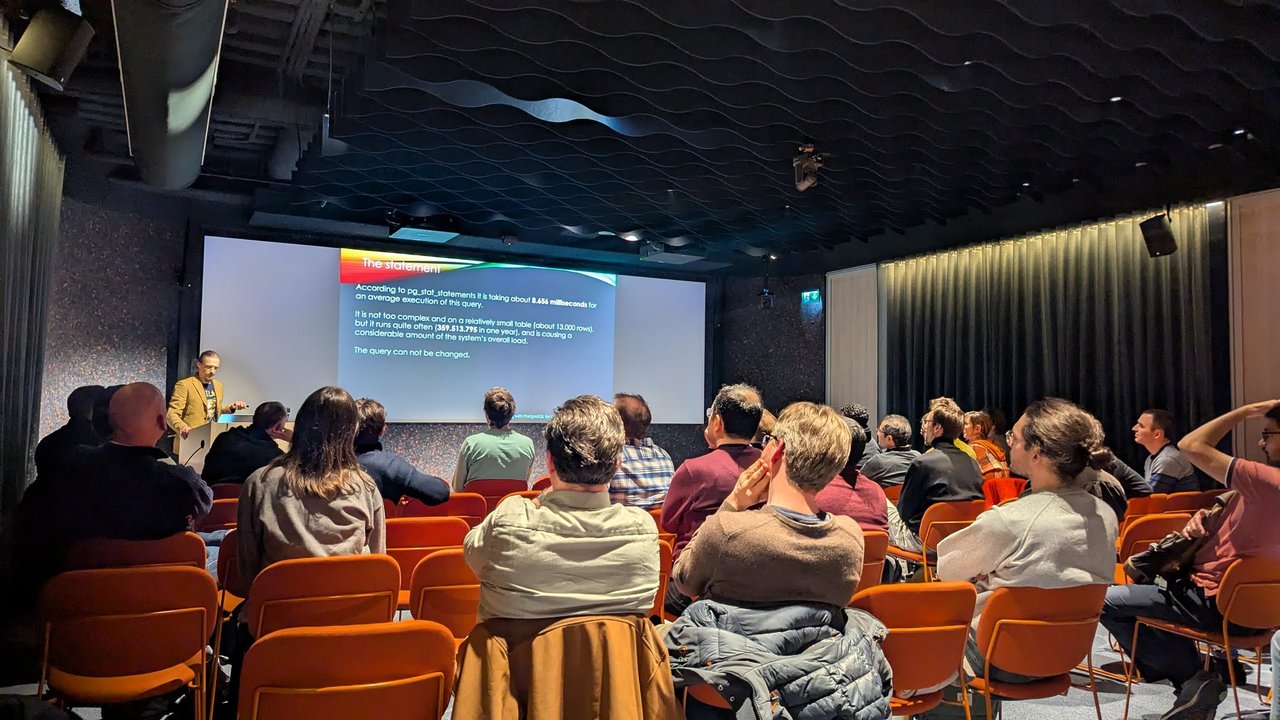 The statement slide in a full room: according to pg_stat_statements the query takes about 8.656 milliseconds and runs 359,513,795 times a year on a table of about 13,000 rows