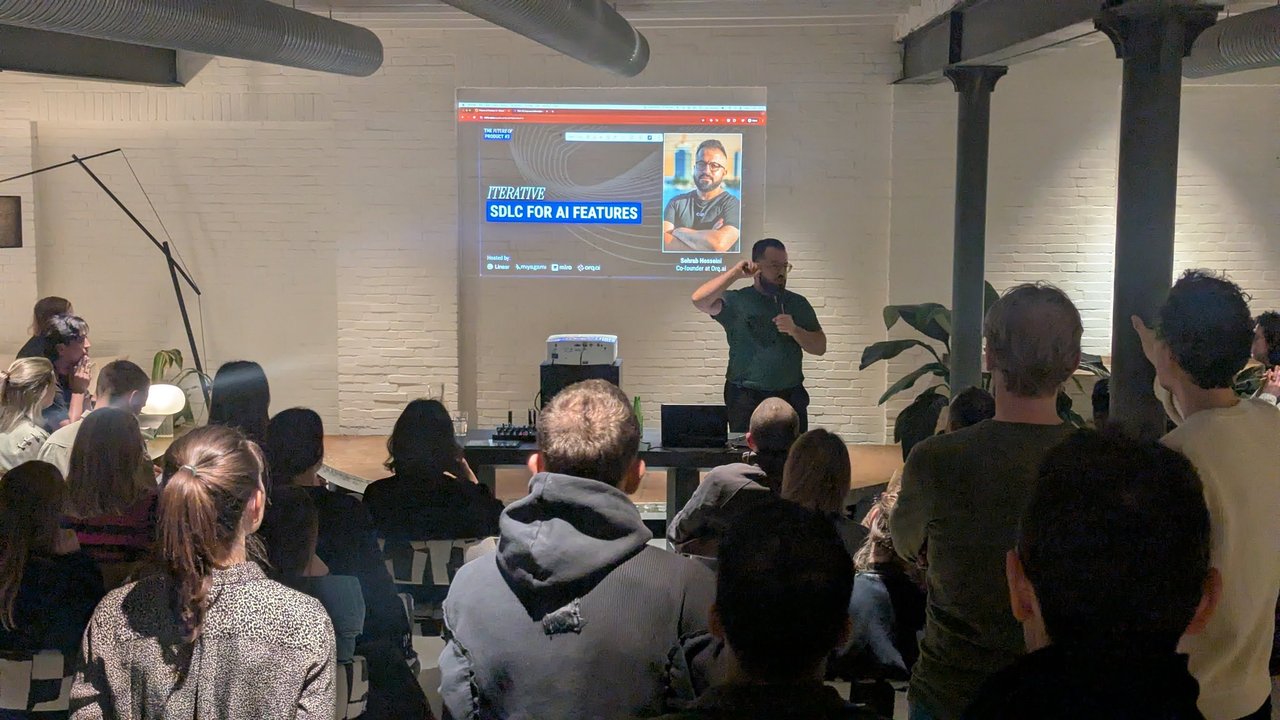 Sohrab Hosseini presenting the Iterative SDLC for AI Features title slide, hosted by Linear, miyagami, Miro and Orq.ai