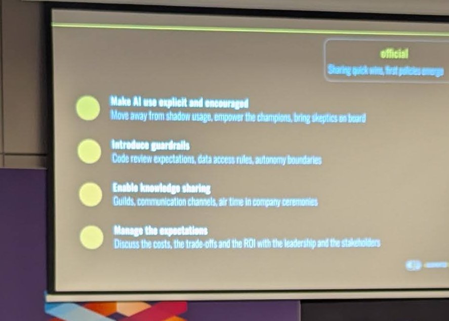 Slide listing four adoption actions: make AI use explicit and encouraged, introduce guardrails, enable knowledge sharing and manage the expectations