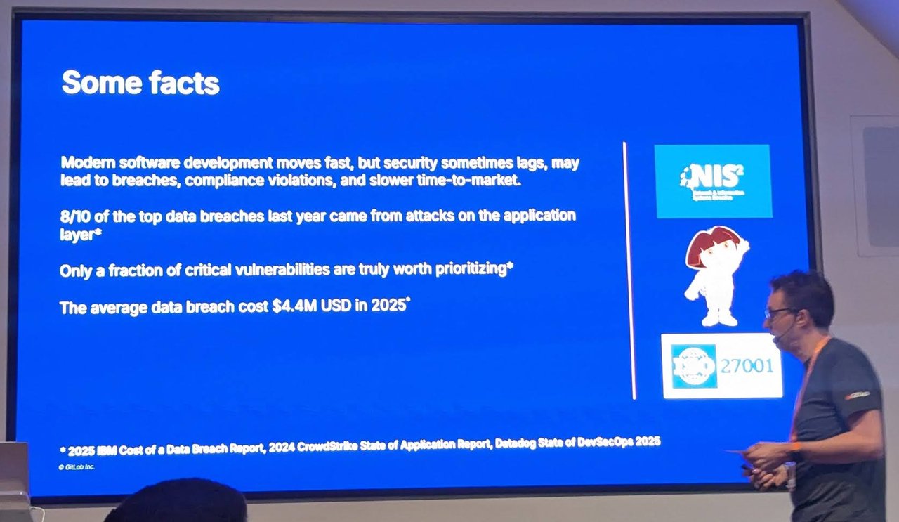 Viktor van den Berg presenting the Some facts slide: application-layer breaches, prioritising critical vulnerabilities and a 4.4 million dollar average breach cost, with NIS2 and ISO 27001 logos