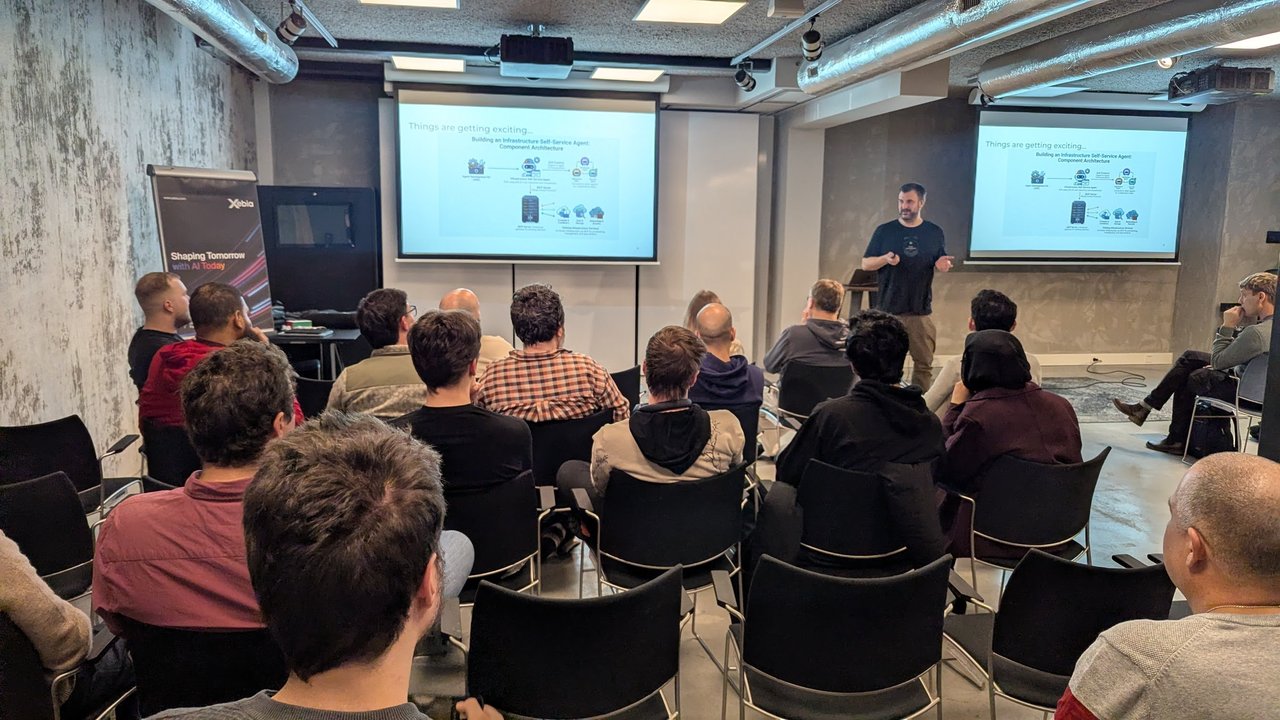 A slide titled Things are getting exciting, Building an Infrastructure Self-Service Agent: Component Architecture, with ADK, the agent, A2A, an MCP server and existing infrastructure services, at the Xebia meetup in Amsterdam