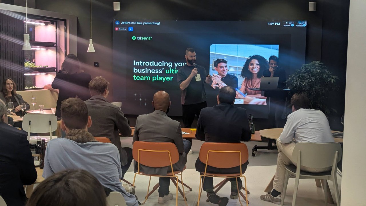 The AiSentr pitch opening slide: Introducing your business' ultimate team player, with the founder speaking