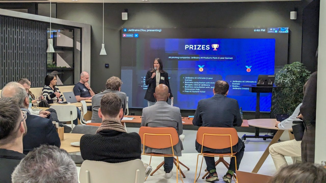 The Prizes slide: all pitching companies receive a JetBrains All Products Pack one-year licence, and the first and third place packages include JetBrains AI Ultimate and business consultations