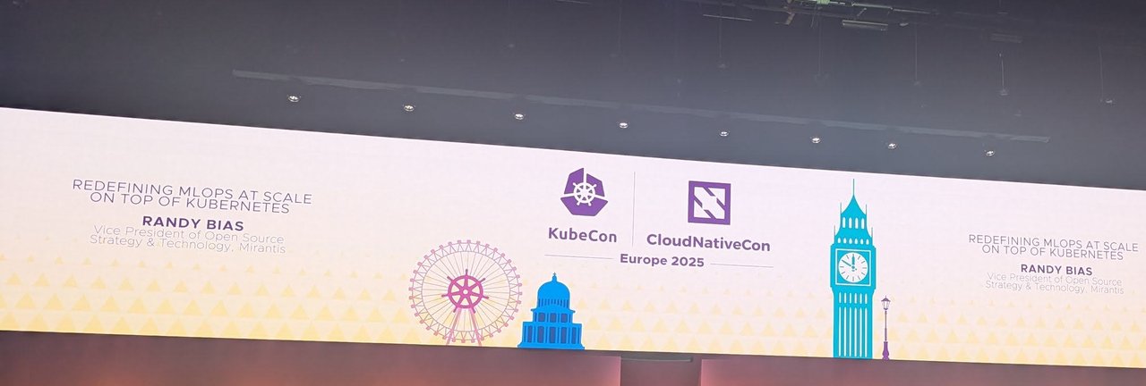 The keynote stage screens naming the sponsored keynote Redefining MLOps at Scale on Top of Kubernetes with Randy Bias, Vice President of Open Source Strategy and Technology at Mirantis
