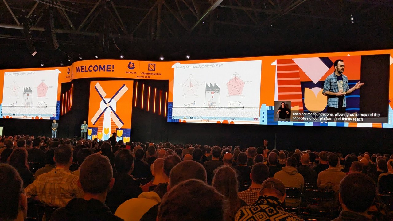 SNCF keynote slide at KubeCon Europe 2026 titled Building Strategic Autonomy OnPrem, with two radar charts either side of a cloud native integration factory drawing