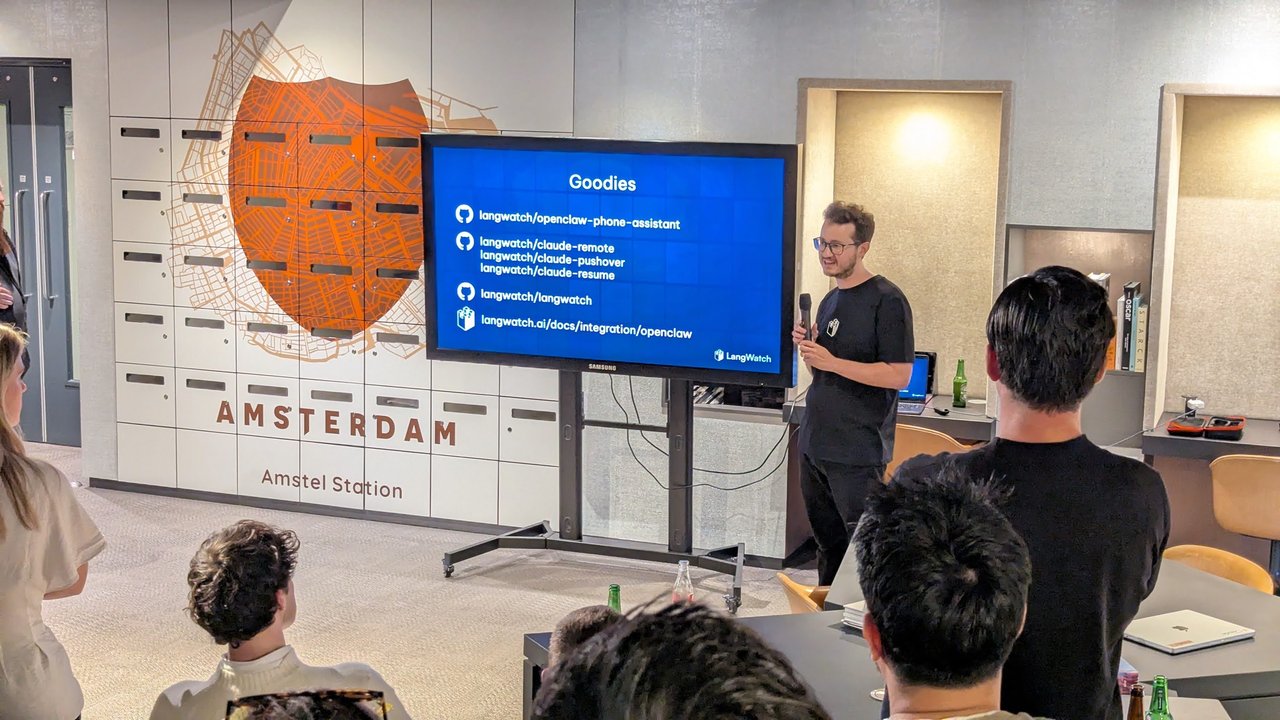 A LangWatch speaker presenting the Goodies slide listing langwatch GitHub repositories and the OpenClaw integration docs