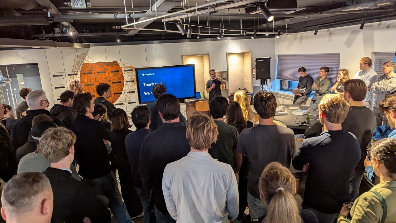 The audience at the AI Foundry office during the LangWatch thank-you slide