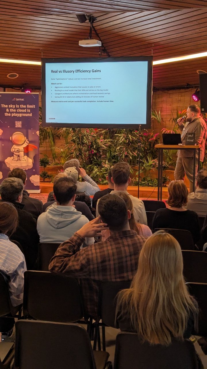 A Coder slide titled Real vs Illusory Efficiency Gains warning about routing to a small model that fails and retries on the big model, and about saving tokens while adding human review