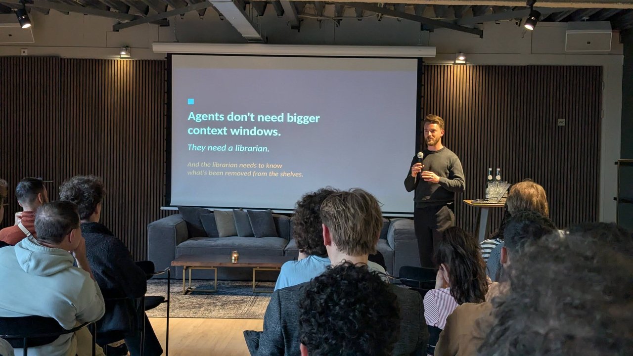 A closing slide: Agents don't need bigger context windows. They need a librarian. And the librarian needs to know what's been removed from the shelves.