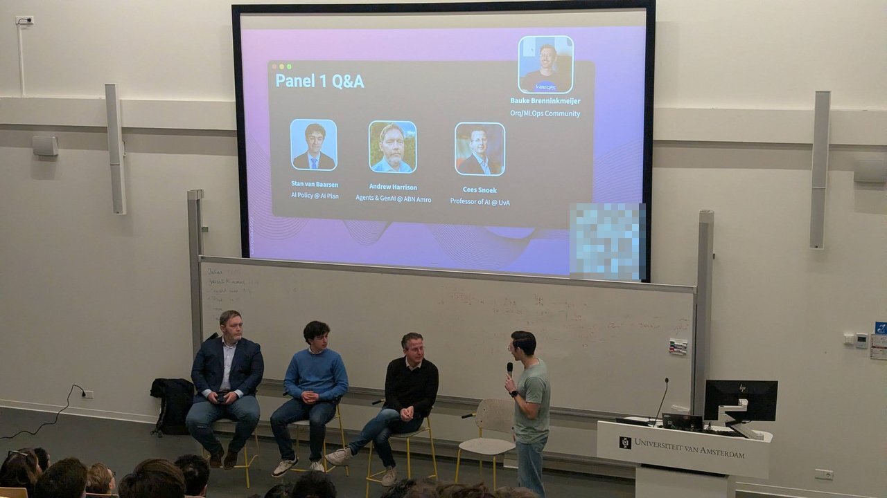 Panel 1 Q&A slide naming Stan van Baarsen, Andrew Harrison, Cees Snoek and moderator Bauke Brenninkmeijer, with the three panellists seated below