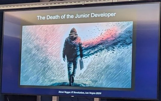 Slide 'The Death of the Junior Developer' with a credit to Steve Yegge, shown on the Mollie stage