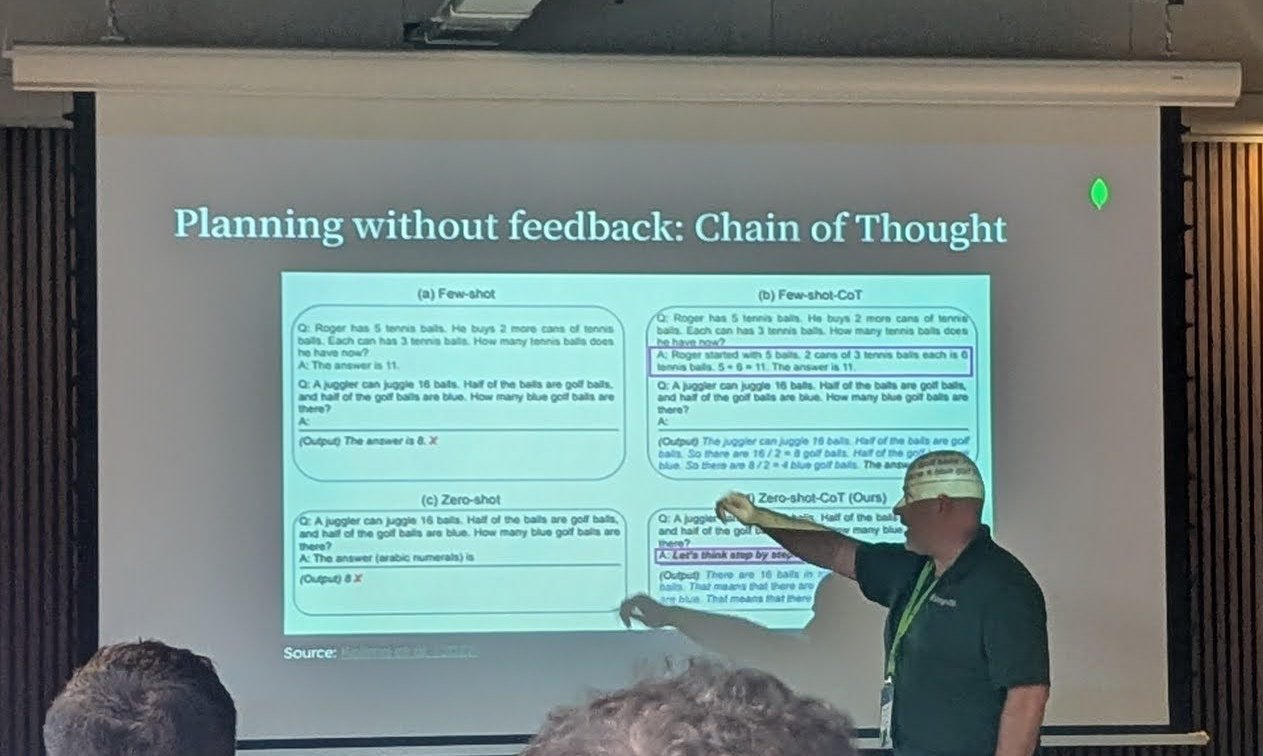 Slide titled Planning without feedback: Chain of Thought, comparing few-shot, few-shot CoT, zero-shot and zero-shot CoT prompts and answers, with the presenter pointing at it