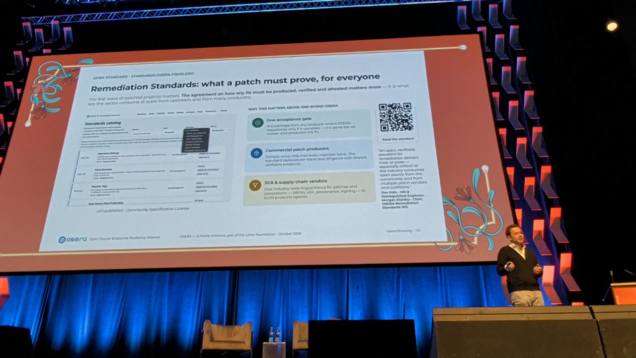 Luca Berton's photograph of the FINOS OSERA remediation standards slide at Open Source Summit Europe 2026