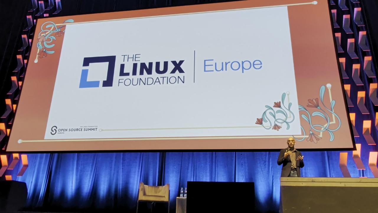 Slide: "Open Standards for Trusted Agentic Workloads" by Laura Tacho, AWS