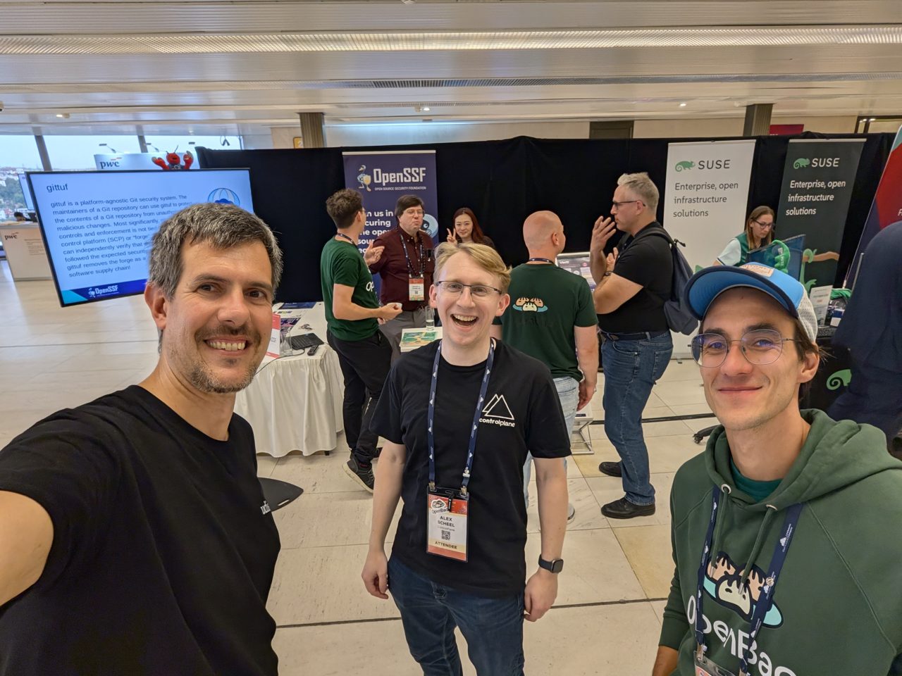 Luca Berton with Alex Scheel and Toni Tauro at the OpenSSF area