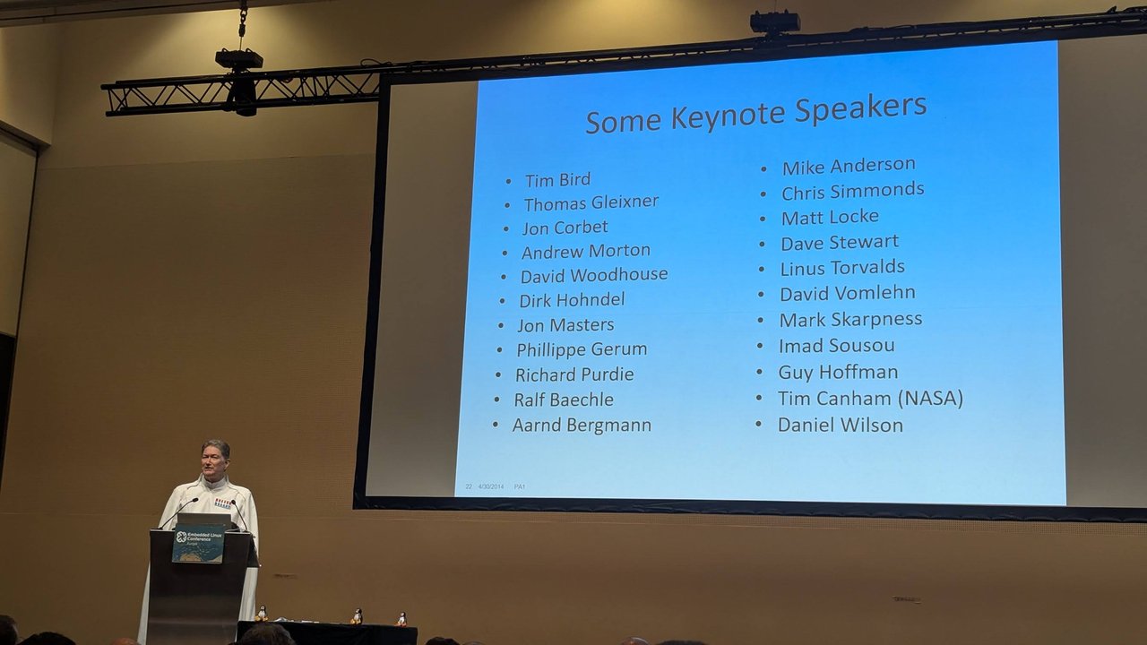 Tim Bird at the Embedded Linux Conference Europe 2025 closing session with a Some Keynote Speakers slide listing past ELC keynote speakers including Linus Torvalds and Thomas Gleixner