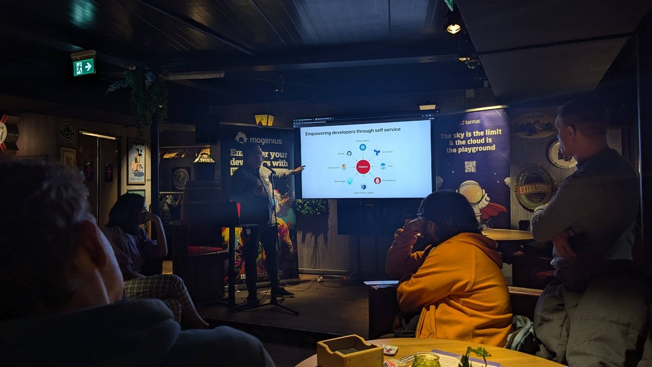 Empowering developers through self service slide with a platform at the centre connected to Kubernetes, Terraform, Flux, Prometheus, Open Policy Agent, Backstage, Crossplane and GitHub