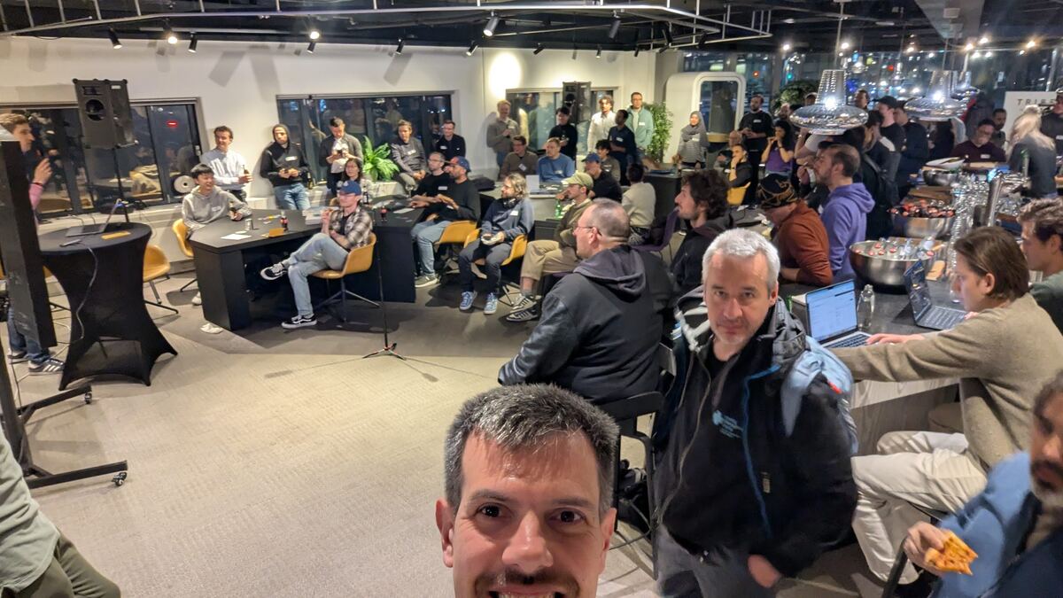 Packed room watching the presentations