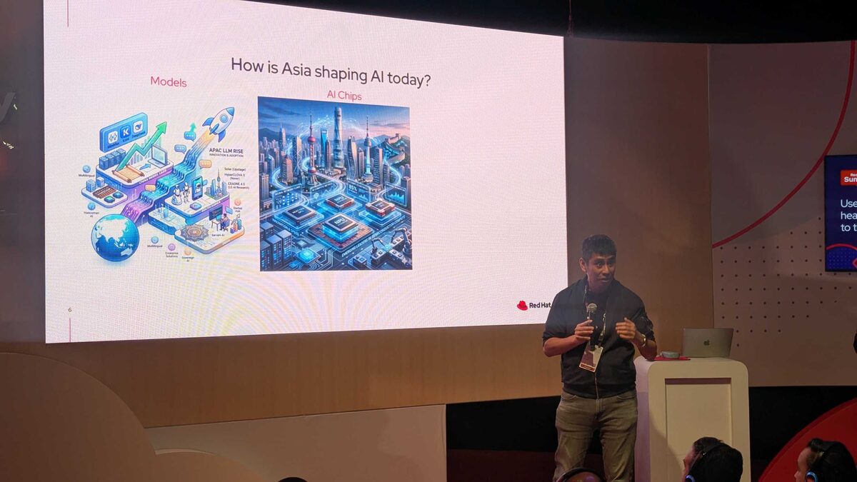 Close-up of the speaker discussing APAC LLM models and AI chips