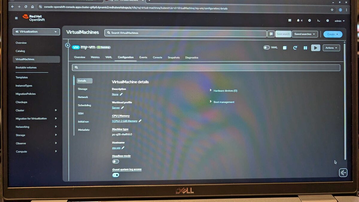 VM details — 1 CPU, 2 GiB Memory, pc-q35-rhel9.6.0 machine type, headless mode