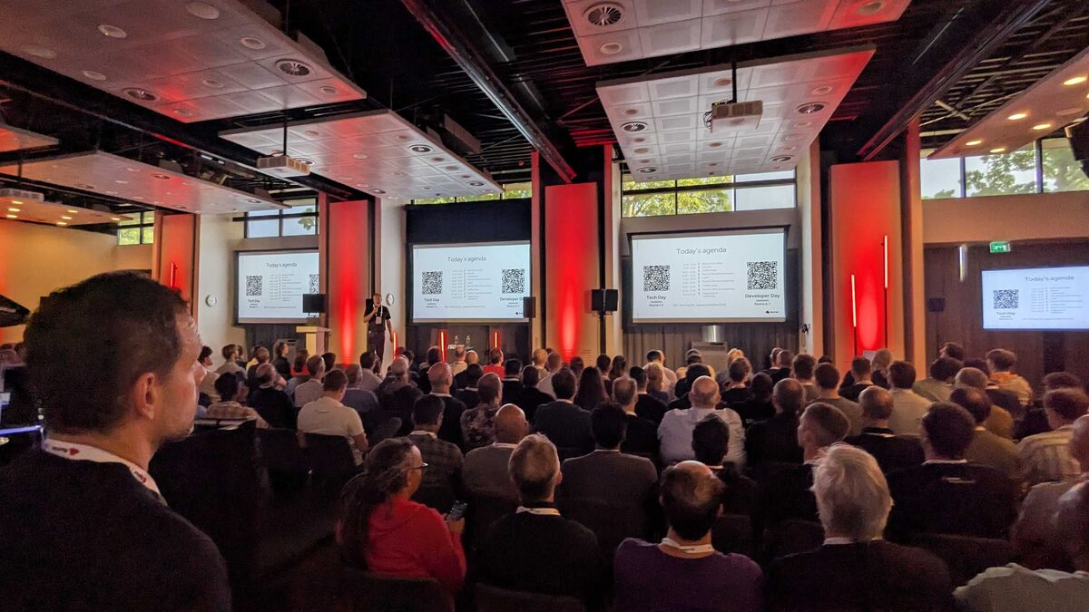 Agenda QR codes — Tech Day and Developer Day tracks on triple screens