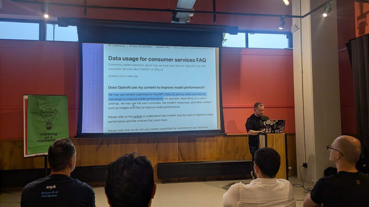 Slide showing OpenAI data usage FAQ — content submitted may be used to improve model performance