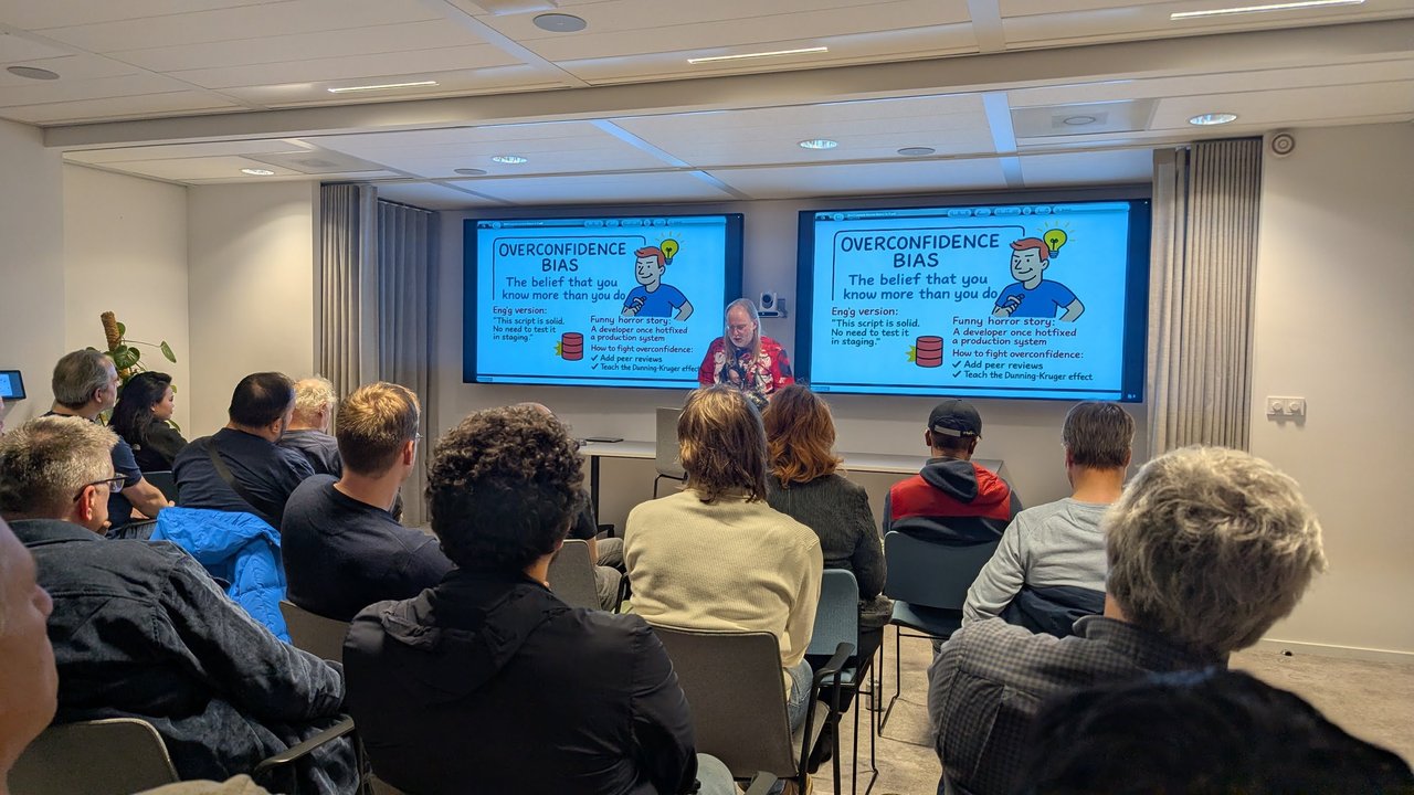 Overconfidence Bias slide at the SRE NL meetup with the example This script is solid, no need to test it in staging, and peer reviews as the fix