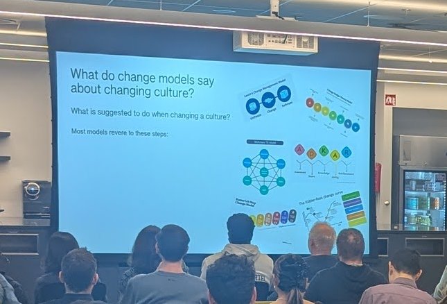 Andrea's slide asking What do change models say about changing culture, with diagrams of Lewin, McKinsey 7-S, ADKAR, Kotter and Kübler-Ross change models