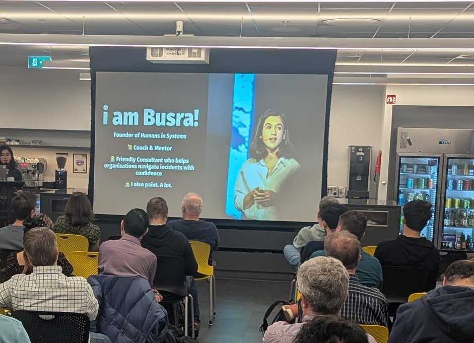 Busra Koken's I am Busra slide: founder of Humans in Systems, coach and mentor, friendly consultant who helps organisations navigate incidents with confidence